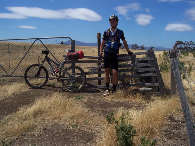 Bicyclist and Bicycle - atop a rise after Glenora.