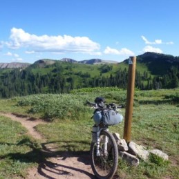 Standard picture of bike leaninng against Colorado Trail marker