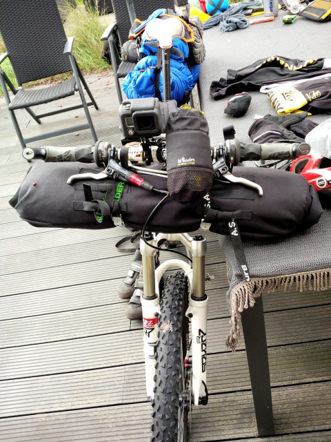 DIY handlebar bag with EMS bivy bag and Decathlon 3/4 sleeping mattress inside.